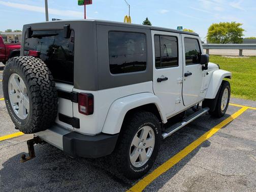 Stone White Clearcoat/Khaki Hard Top 2010 Jeep Wrangler Unlimited Sahara