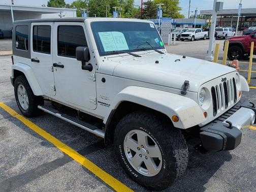 Stone White Clearcoat/Khaki Hard Top 2010 Jeep Wrangler Unlimited Sahara