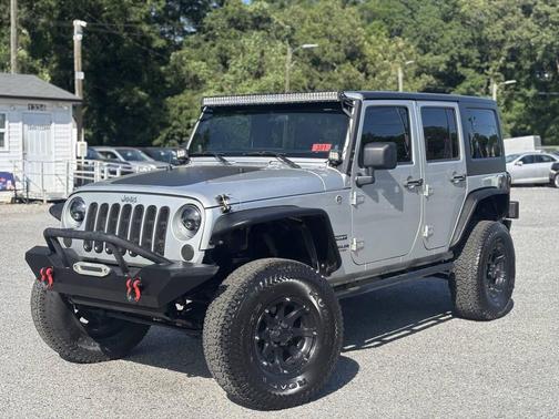Bright Silver Metallic Clearcoat 2012 Jeep Wrangler Unlimited Sport