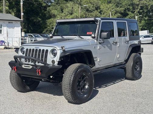 Bright Silver Metallic Clearcoat 2012 Jeep Wrangler Unlimited Sport
