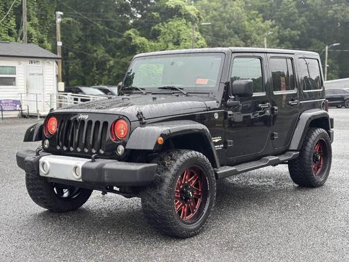Black 2015 Jeep Wrangler Unlimited Sahara