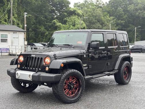 Black 2015 Jeep Wrangler Unlimited Sahara