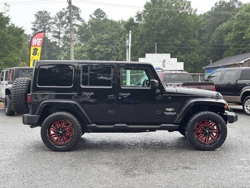 Black 2015 Jeep Wrangler Unlimited Sahara