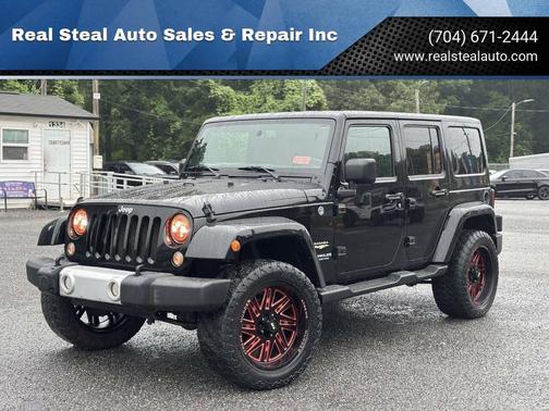 Black 2015 Jeep Wrangler Unlimited Sahara