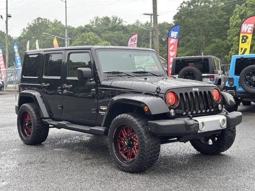 Black 2015 Jeep Wrangler Unlimited Sahara