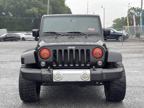 Black 2015 Jeep Wrangler Unlimited Sahara