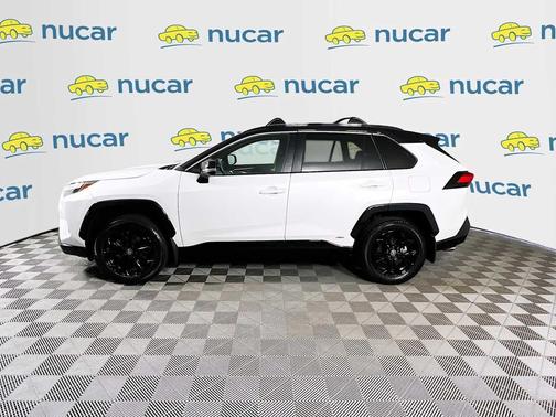 Wind Chill Pearl/Midnight Black Metallic 2024 Toyota RAV4 Hybrid SE