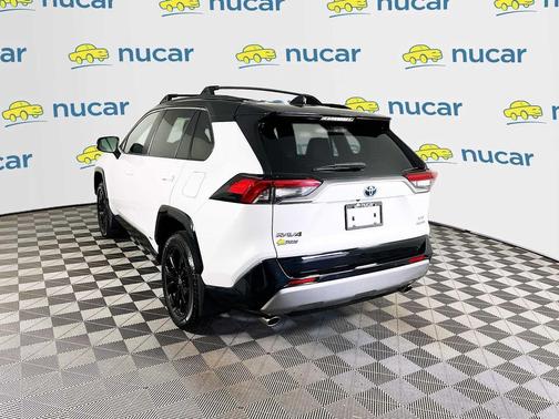 Wind Chill Pearl/Midnight Black Metallic 2024 Toyota RAV4 Hybrid SE