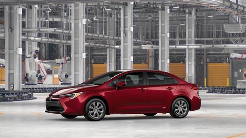 Ruby Flare Pearl 2026 Toyota Corolla Hybrid LE
