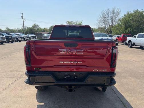 Volcanic Red Tintcoat 2026 GMC Sierra 2500 AT4X