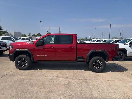 Volcanic Red Tintcoat 2026 GMC Sierra 2500 AT4X