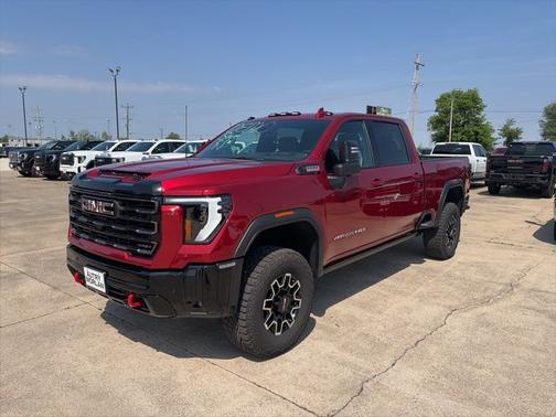 Volcanic Red Tintcoat 2026 GMC Sierra 2500 AT4X