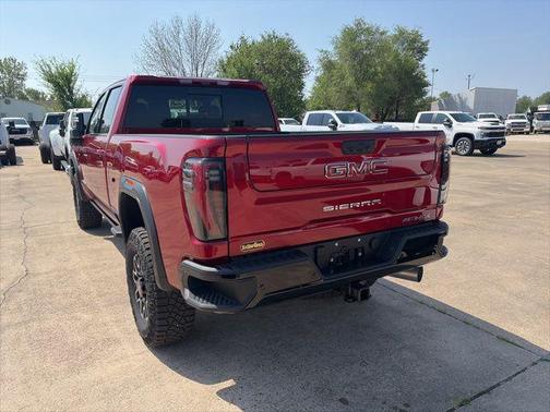 Volcanic Red Tintcoat 2026 GMC Sierra 2500 AT4X