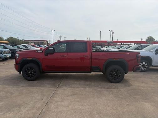 Volcanic Red Tintcoat 2026 GMC Sierra 2500 AT4