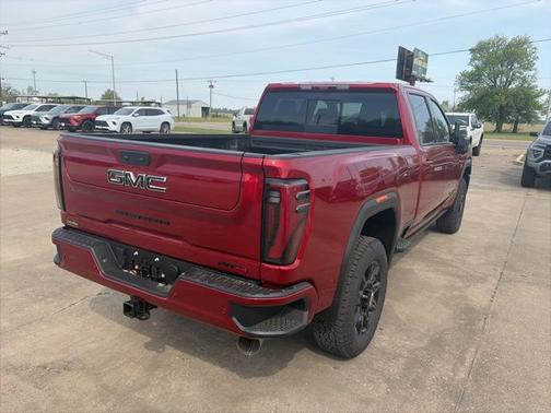 Volcanic Red Tintcoat 2026 GMC Sierra 2500 AT4