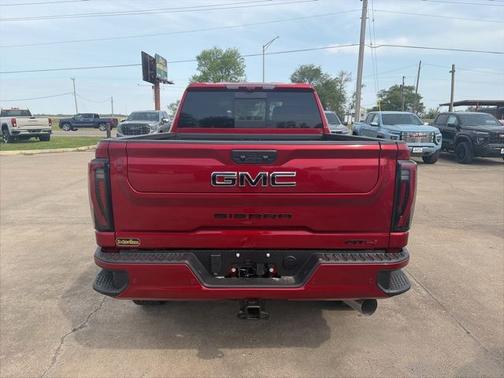 Volcanic Red Tintcoat 2026 GMC Sierra 2500 AT4