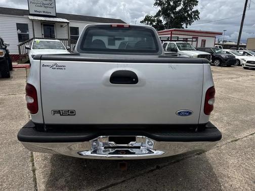 Silver Frost Clearcoat Metallic 1997 Ford F-150 Reg. Cab Flareside Short Bed 2WD