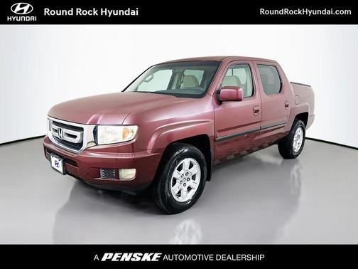 Red 2010 Honda Ridgeline RTS