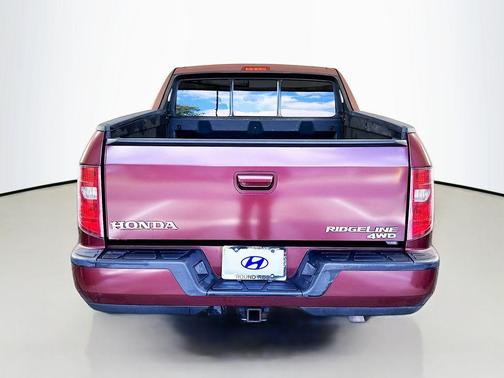 Red 2010 Honda Ridgeline RTS