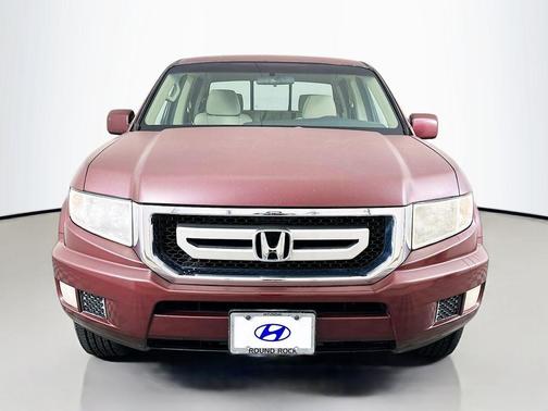 Red 2010 Honda Ridgeline RTS