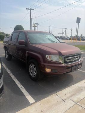 Red 2010 Honda Ridgeline RTS