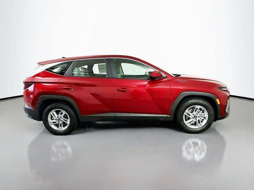 Red 2026 Hyundai TUCSON SE