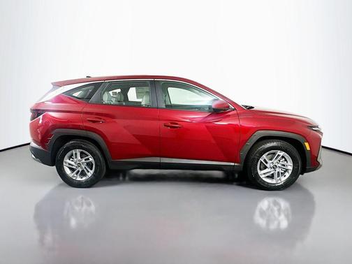 Red 2026 Hyundai TUCSON SE