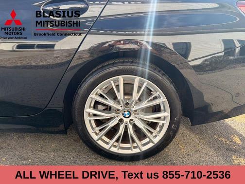 Jet Black 2023 BMW 330 i xDrive