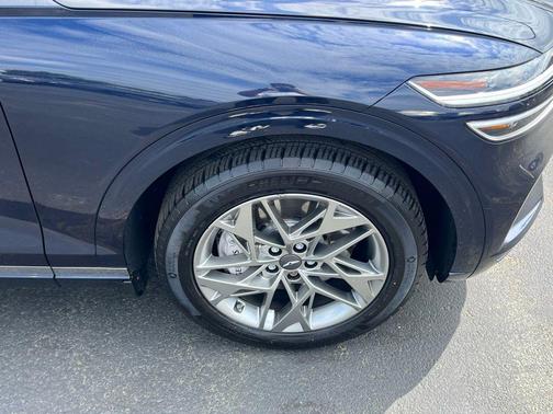 Capri Blue 2023 Genesis GV70 2.5T AWD