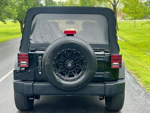 Black 2014 Jeep Wrangler Unlimited Sport