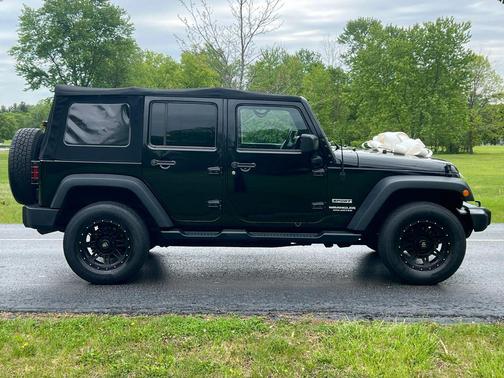 Black 2014 Jeep Wrangler Unlimited Sport
