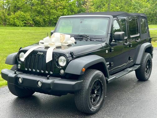 Black 2014 Jeep Wrangler Unlimited Sport SUV