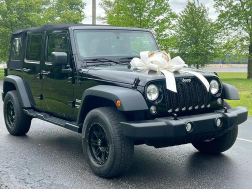 Black 2014 Jeep Wrangler Unlimited Sport