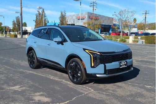 Heritage Blue 2026 Kia Sportage Hybrid SX-Prestige