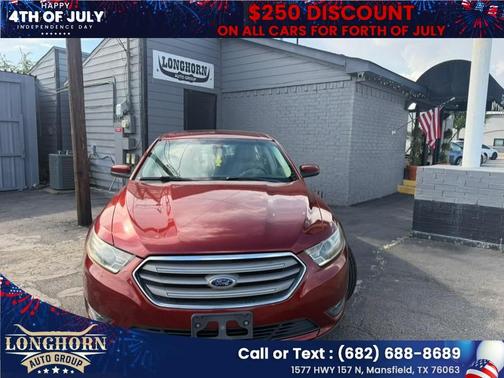 Orange 2014 Ford Taurus 4dr Sdn SEL FWD