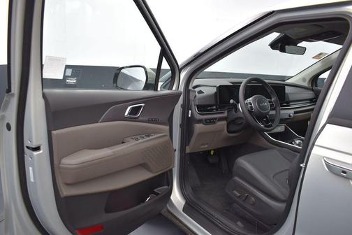 Ivory Silver 2026 Kia Carnival Hybrid EX