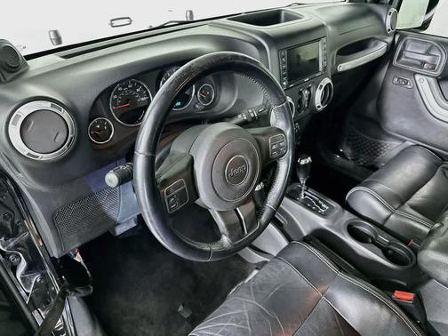 Black Clearcoat 2012 Jeep Wrangler Unlimited Sahara