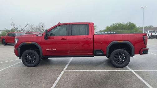 Volcanic Red Tintcoat 2024 GMC Sierra 3500 AT4