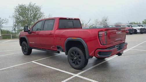 Volcanic Red Tintcoat 2024 GMC Sierra 3500 AT4