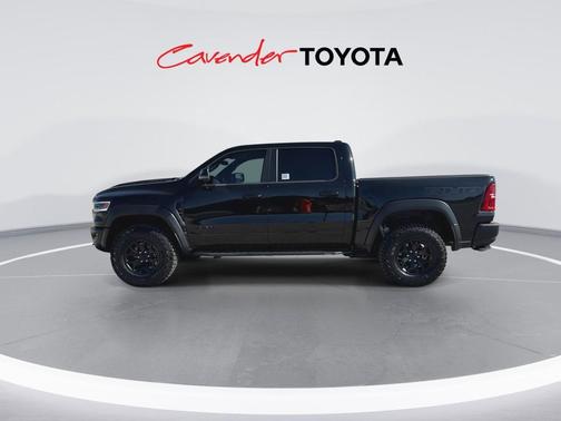 Diamond Black Crystal Pearlcoat 2026 RAM 1500 RHO Crew Cab 4x4 5'7' Box
