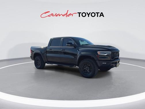 Diamond Black Crystal Pearlcoat 2026 RAM 1500 RHO Crew Cab 4x4 5'7' Box