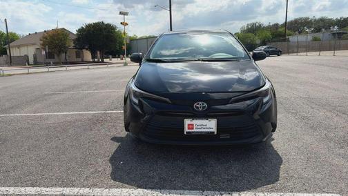 Midnight Black Metallic 2024 Toyota Corolla Hybrid LE