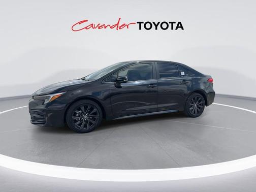 Midnight Black Metallic 2024 Toyota Corolla Hybrid SE