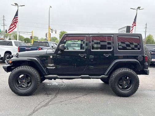 Black Forest Green Pearlcoat 2012 Jeep Wrangler Unlimited Sahara