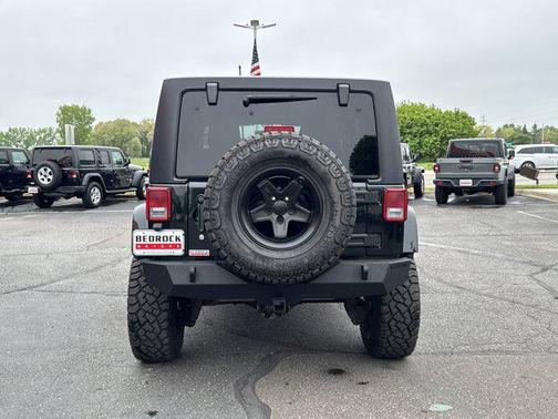 Black Forest Green Pearlcoat 2012 Jeep Wrangler Unlimited Sahara