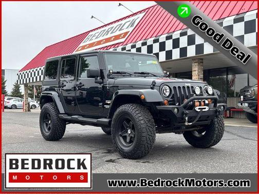 Black Forest Green Pearlcoat 2012 Jeep Wrangler Unlimited Sahara