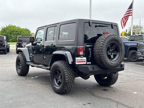 Black Forest Green Pearlcoat 2012 Jeep Wrangler Unlimited Sahara