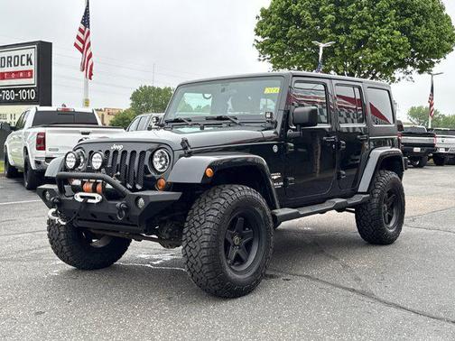 Black Forest Green Pearlcoat 2012 Jeep Wrangler Unlimited Sahara