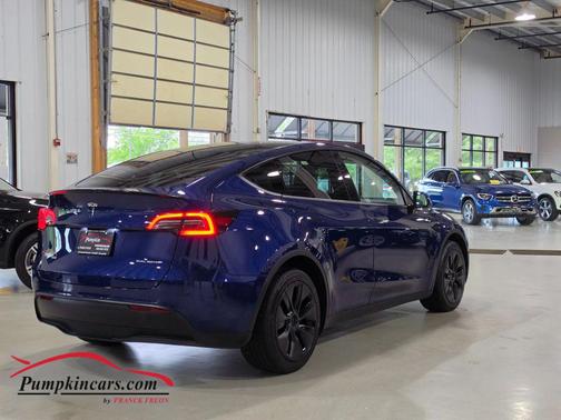 Blue 2024 Tesla Model Y Long Range Sport Utility 4D