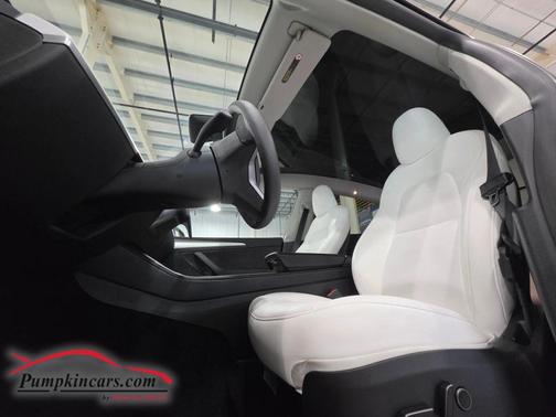 Blue 2024 Tesla Model Y Long Range Sport Utility 4D